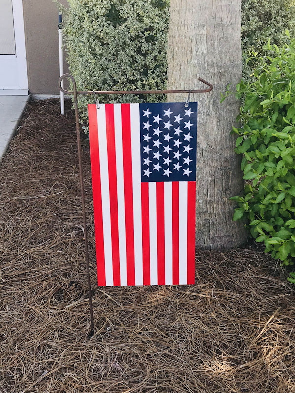 Easy DIY project using pallet boards to make a USA flag to hang on a garden flag pole. This flag will last much longer