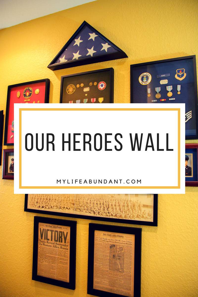 Remembering our heroes in our family with a wall of honor in our home. Learn how we displayed pictures, patches, medals, etc.