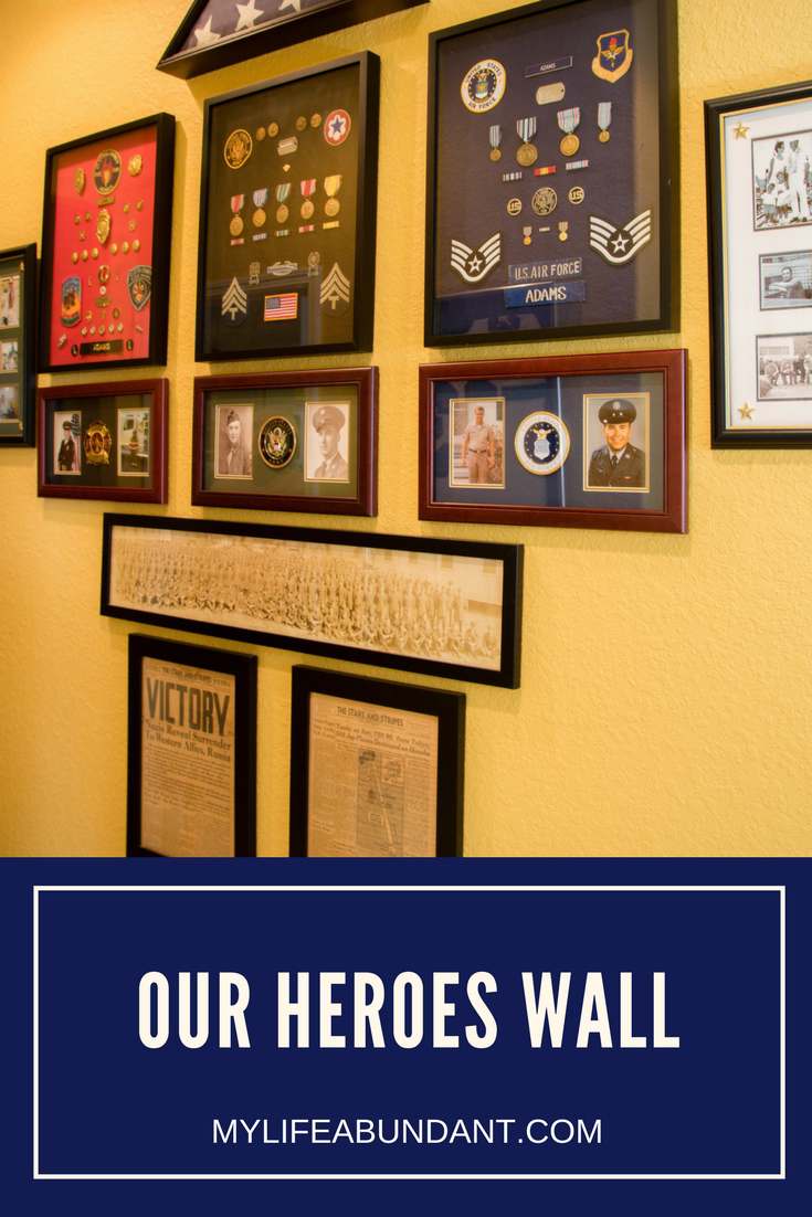 Remembering our heroes in our family with a wall of honor in our home. Learn how we displayed pictures, patches, medals, etc.
