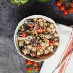 Yummy chickpea salad recipe with a Mediterranean flavor you will want to make over and over! Great healthy lunch or easy side dish that keeps well.